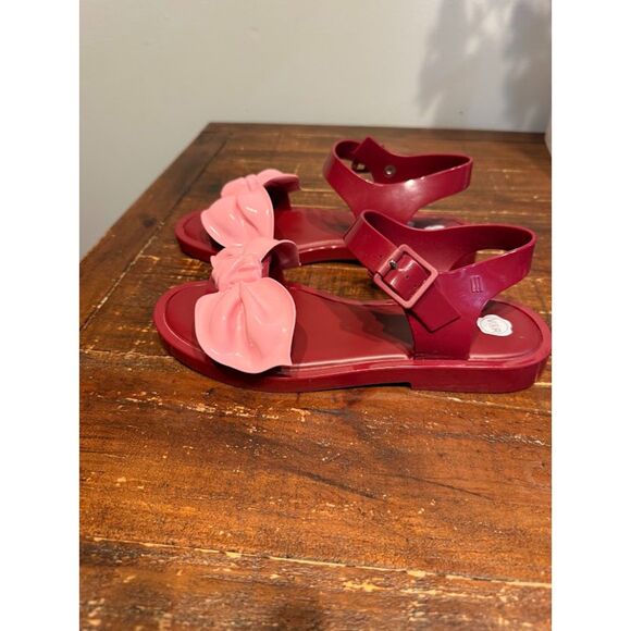 Shoes - 🌴Melissa Tie Mar Sandal in a red and pink color combination.
